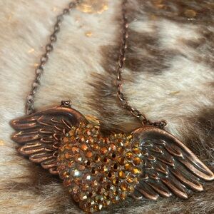 Elegant Winged Heart Necklace with copper Swarovski crystals
